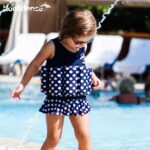 KONFIDENCE FLOATSUIT LYCRA BUOYANT AID TO SWIMMING NAVY POLKA DOT 2-3 YEARS – Image 3